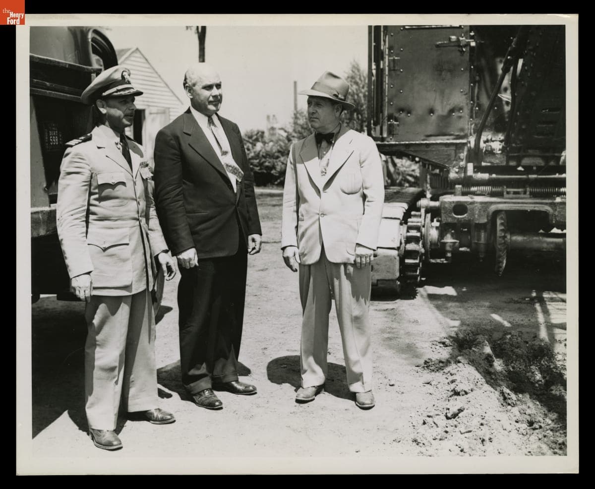 Navy Officer, Ray Rausch and Harry Bennett at Groundbreaking for Swimming Pool at Navy Service School, Ford Rouge Plant, 1943