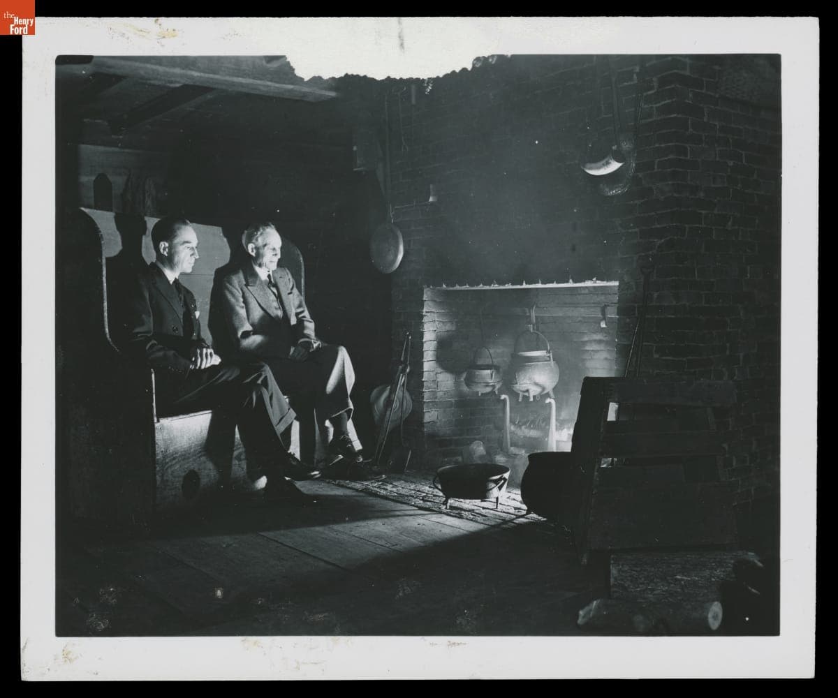 Henry Ford and Edsel Ford by Fireplace at Plympton Family Home in Greenfield Village, 1941