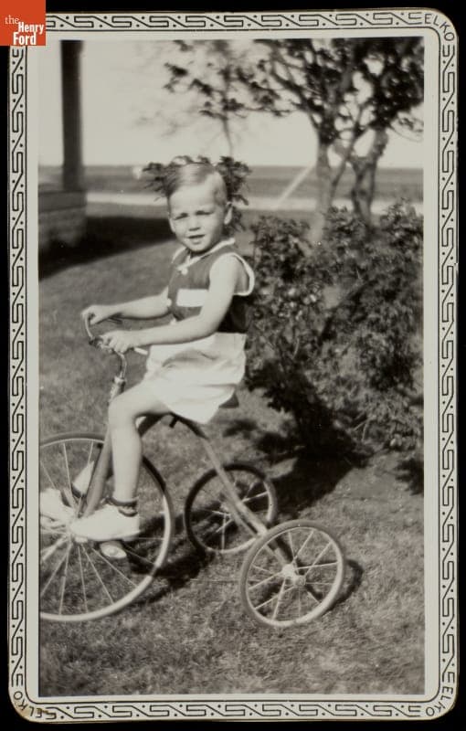 Boy Riding a Tricycle, circa 1940