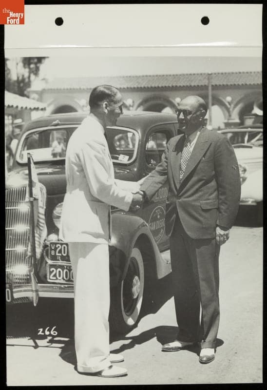 Two-Millionth Ford V-8 Driver Jimmy Rooney and Official Elwood Bailey, California Pacific International Exposition, San Diego, 1935