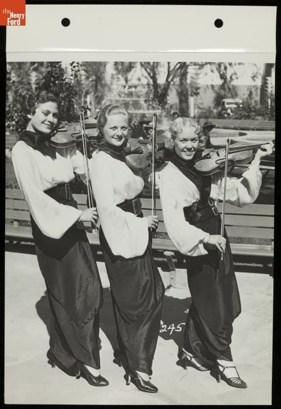 Trio of Violinists from Jose Manzanares' South American Orchestra, Patio of the Ford Building, California Pacific International Exposition, San Diego, 1935