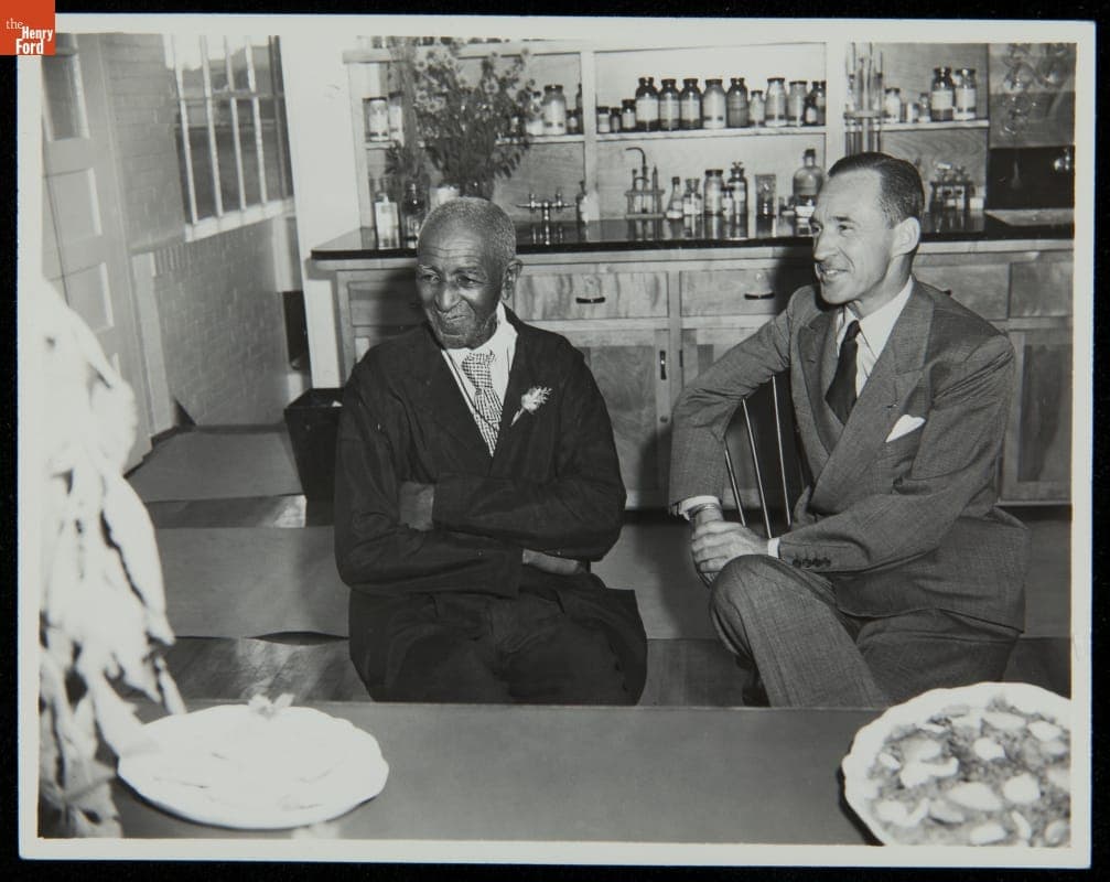 George Washington Carver and Edsel Ford at the Carver Nutrition Laboratory, Dearborn, Michigan, 1942