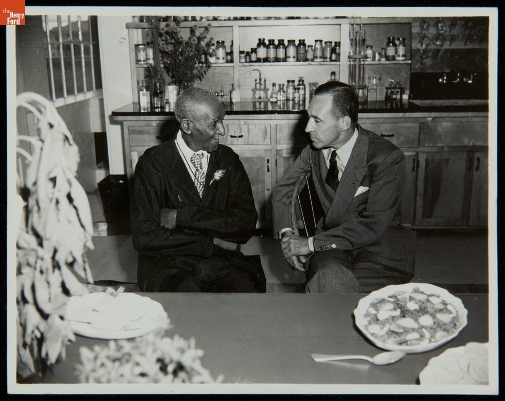George Washington Carver and Edsel Ford at the Carver Nutrition Laboratory, Dearborn, Michigan, 1942