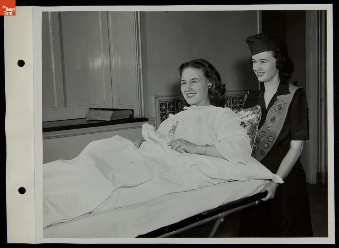 Girl Scout Aiding a Patient While Doing Community Service at Henry Ford Hospital, Detroit, Michigan, 1946