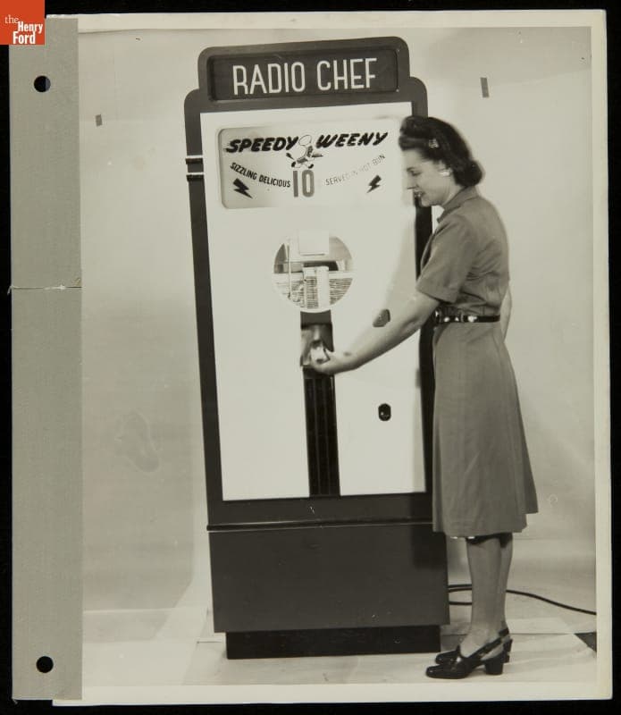 Woman Using "Speedy Weeny" Hot Dog Vending Machine, 1945-1947