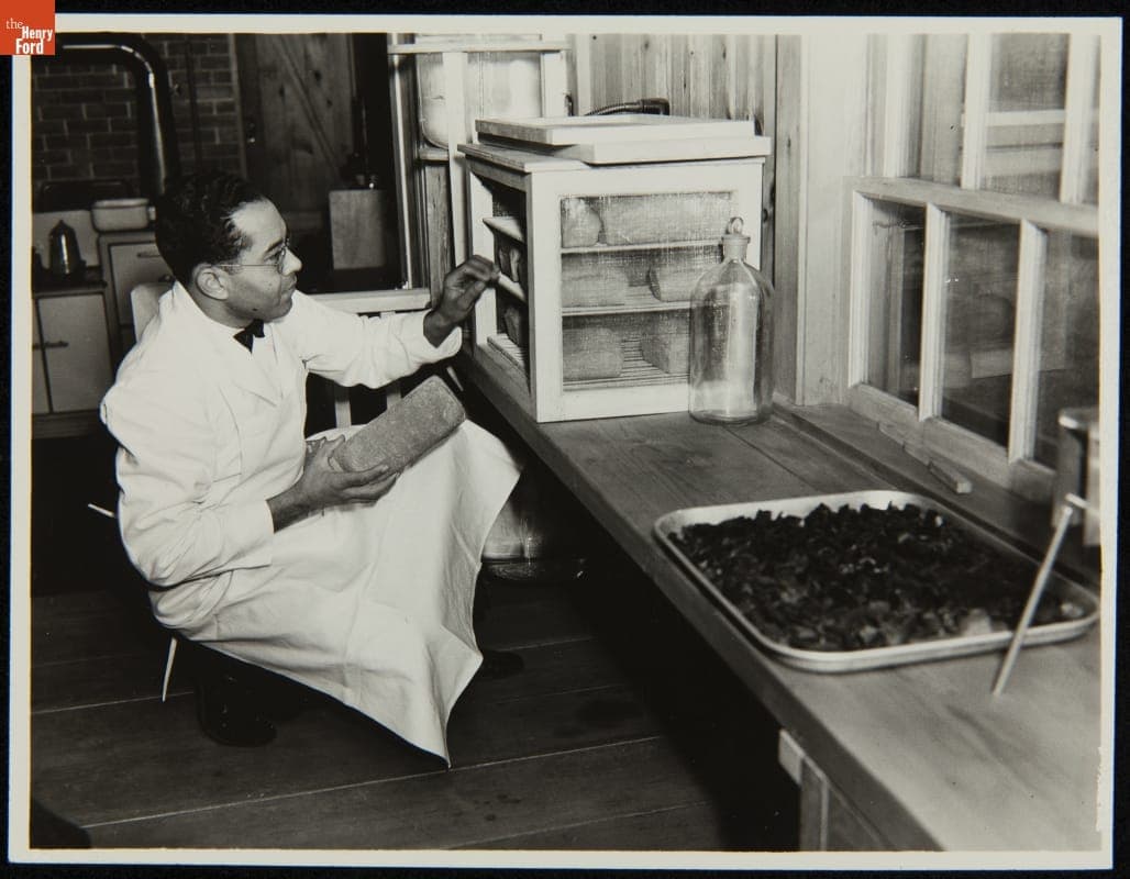 Worker Storing Bread in the Soybean Laboratory in Greenfield Village, circa 1935