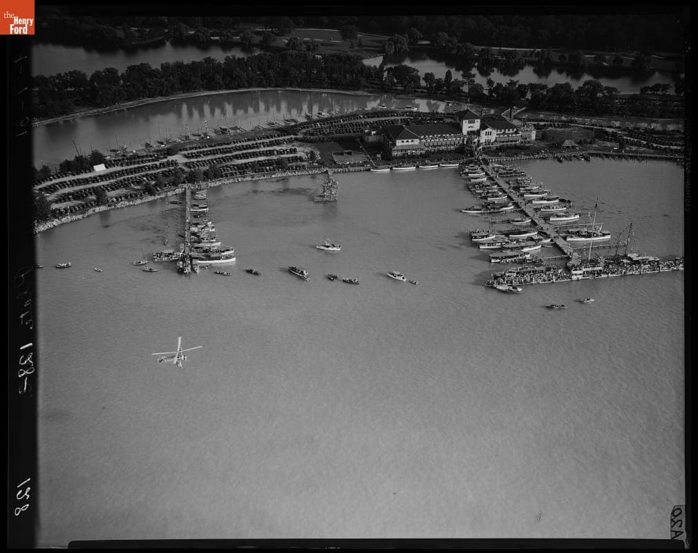 Detroit News--Autogiro--Carrying Judge during Harmsworth Regatta Showing Yacht Club