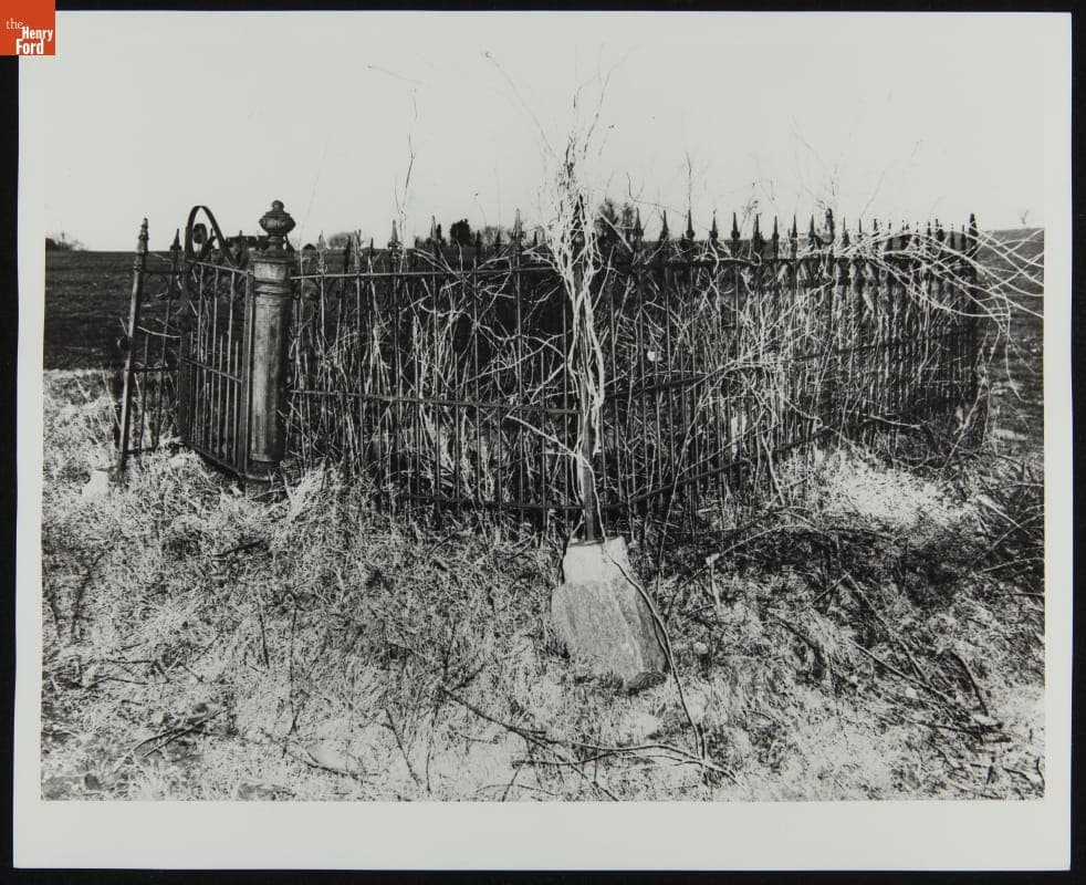 Iron Fence Surrounding the Original Location of the Tombstone Marking the Grave of Christopher and John Rousby, 1942