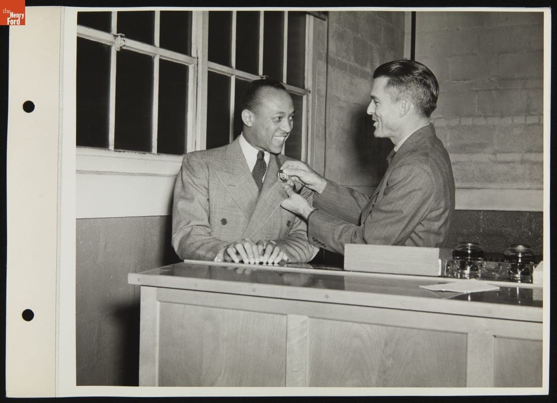 Tommy Bridges Welcomes Jesse Owens to Work at Ford Motor Company, November 23, 1942