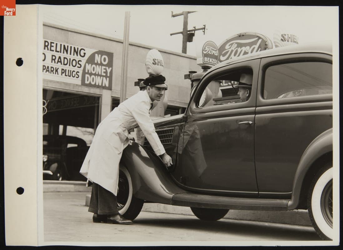 Attendant Lifting Hood of Car at Ford Super Service Station, April 1936