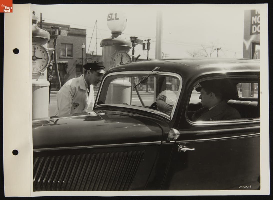 Attendant Talking with Customer at Service Station, April 1936