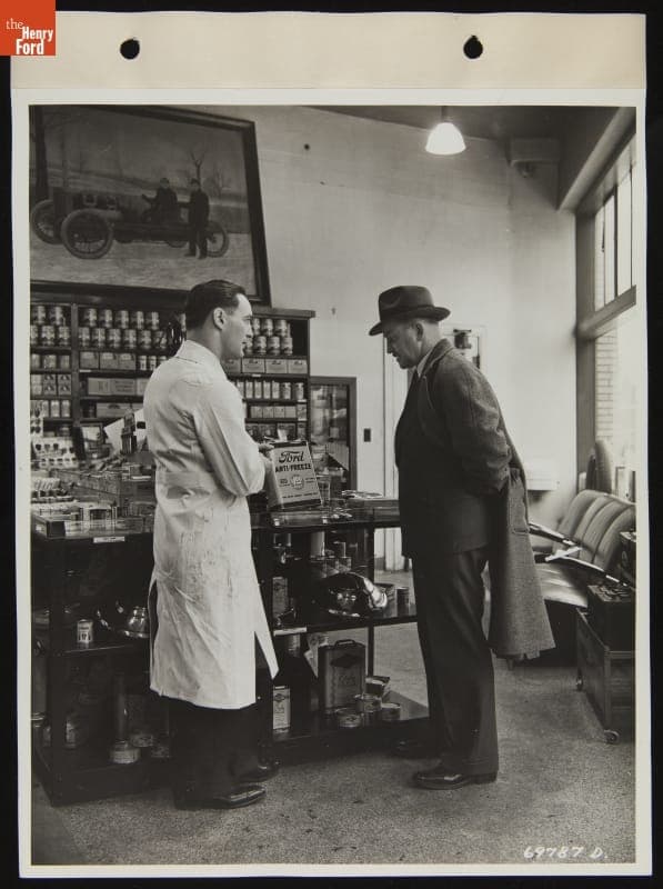 Service Attendant Shows Customer Ford Accessories, January 1938