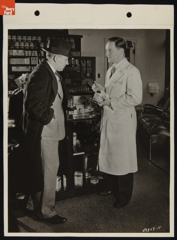 Service Attendant Shows Customer Ford Accessories, February 1938