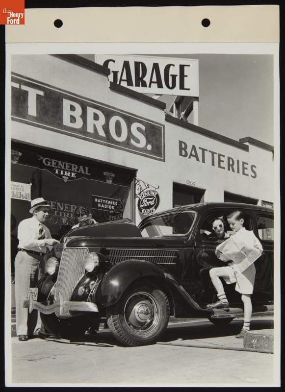 Attendant Works on Family Car at Bennet Brothers Super Service Station, April 1938