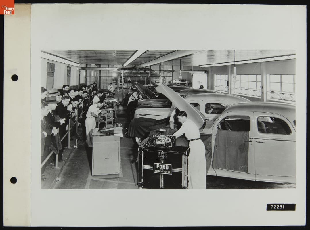 Crowd Watches Attendant Use Laboratory Test Kit, Illustration in the August 1939 Ford Merchandising Bulletin