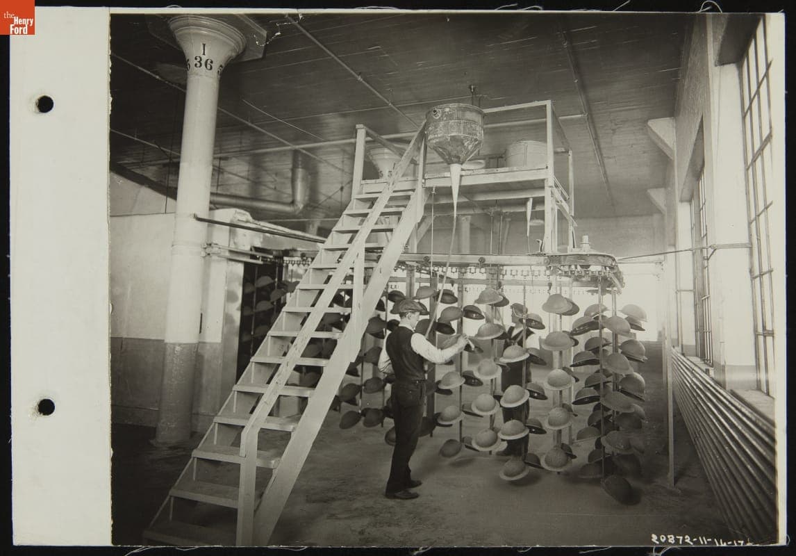 Man Spray Painting Army Helmets, Ford Motor Company Philadelphia Plant, November 1917