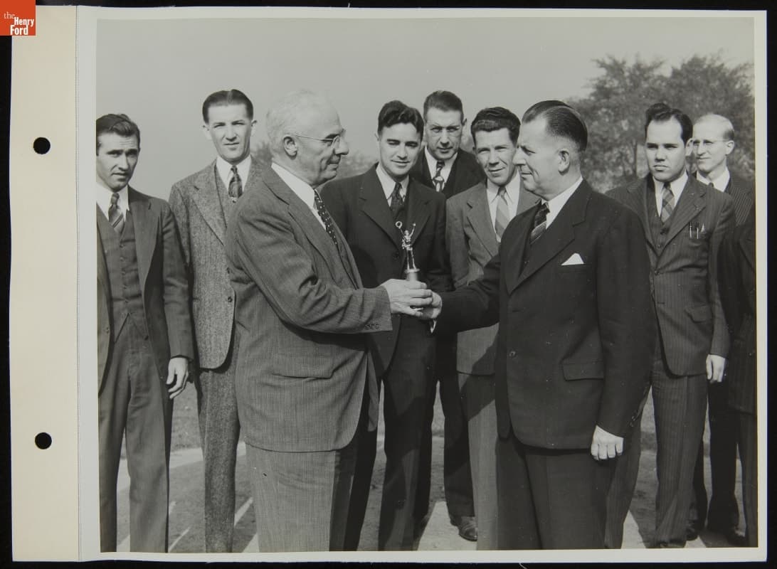 A.G. Coulton Presenting Softball Championship Trophy to N. Fuller, 1943