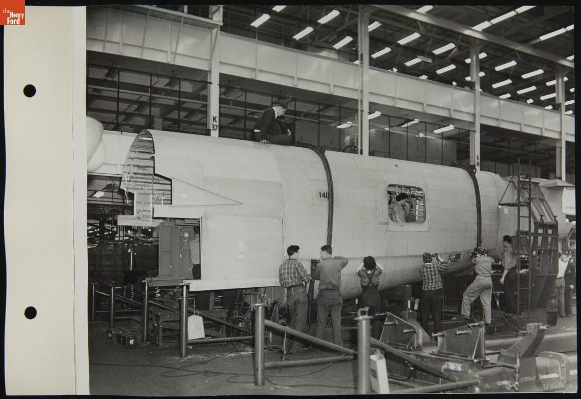 Employees at Willow Run Assembling Bomber Frame, February 1943