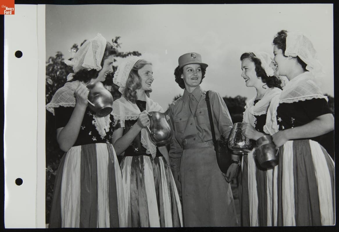 Woman Soldier with "Modern Molly Pitchers" Selling War Bonds and Stamps on National Molly Pitcher Tag Day, August 4, 1943