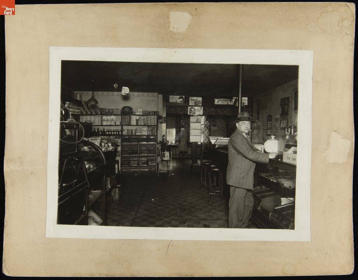 Customer Standing inside a General Store, 1930