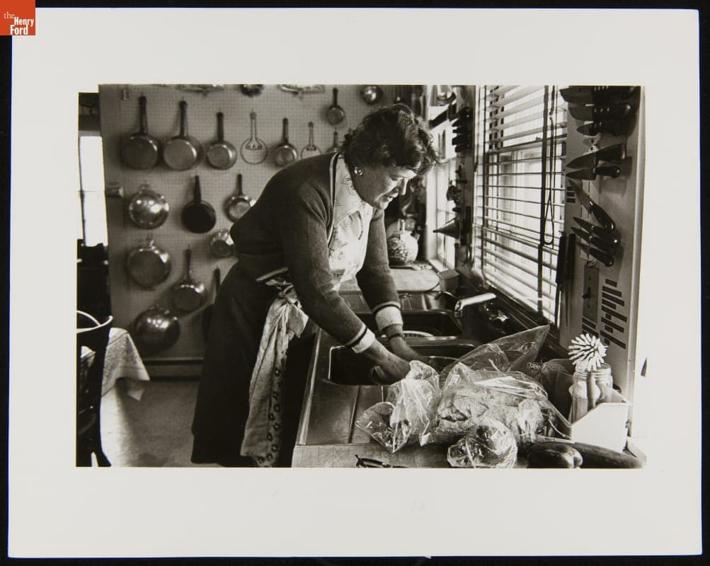 Julia Child Working at the Sink in Her Kitchen, 1977