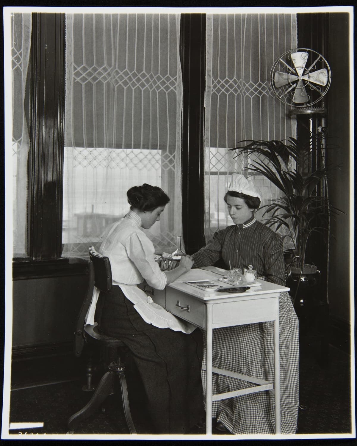Manicurist and Employee inside Main Plant, H. J. Heinz Company, Pittsburgh, Pennsylvania, 1912