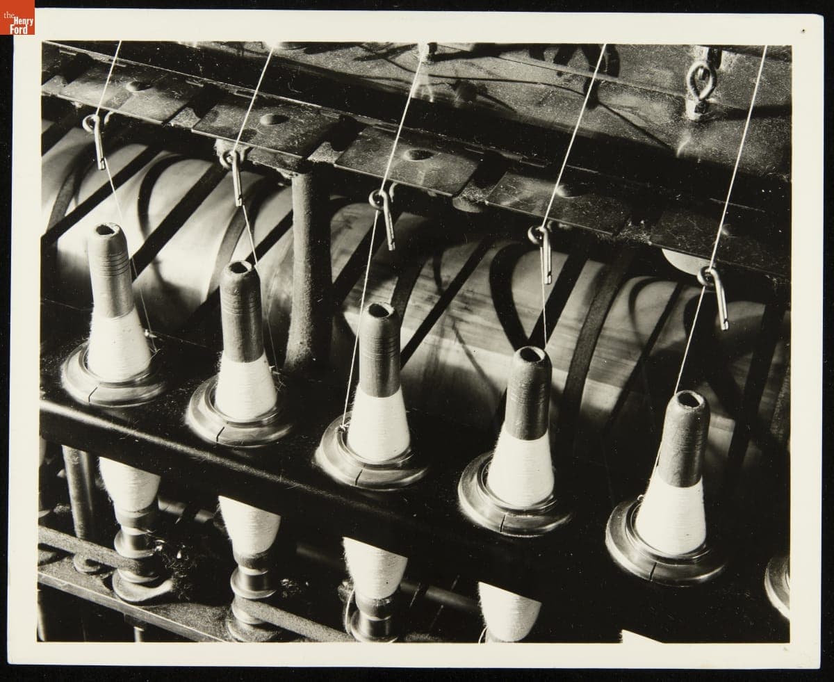 Close up of a Bobbin on a Textile Spinning Machine, circa 1935