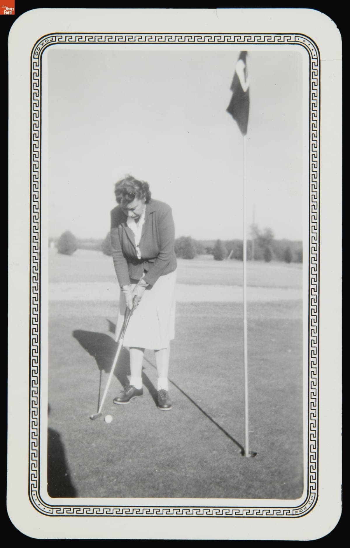 Woman Putting on a Golf Course, 1947