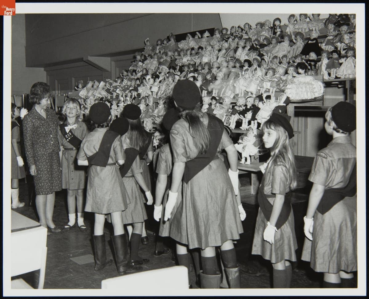 Members of Girl Scout Intermediate Troop 217 Viewing a Doll Display, November 1966