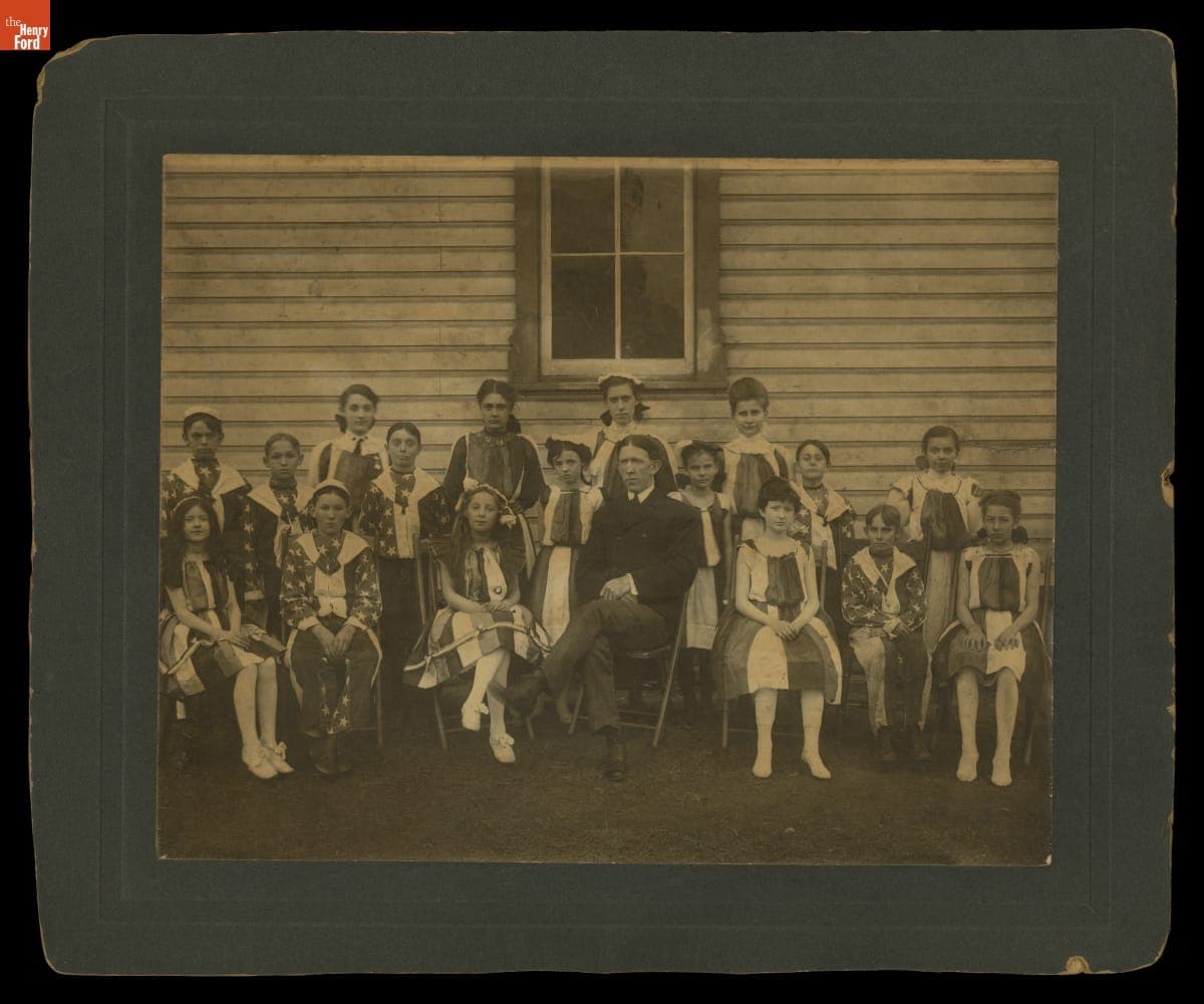 Students Dressed in Patriotic Costumes, with Teacher, circa 1905
