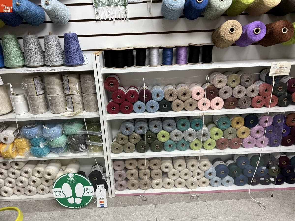 Social Distancing Sign inside Heritage Spinning & Weaving Shop as Used during COVID-19 Pandemic