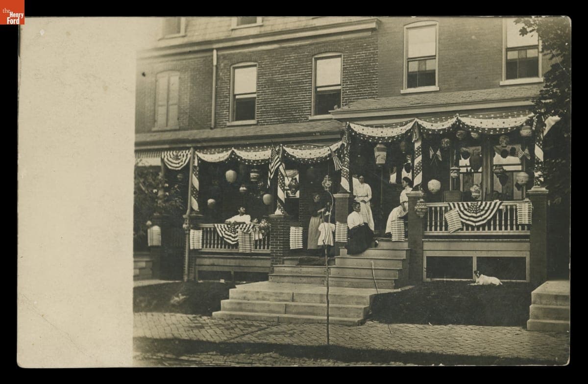 People Gathered on a Porch Decorated for the Fourth of July, circa 1910