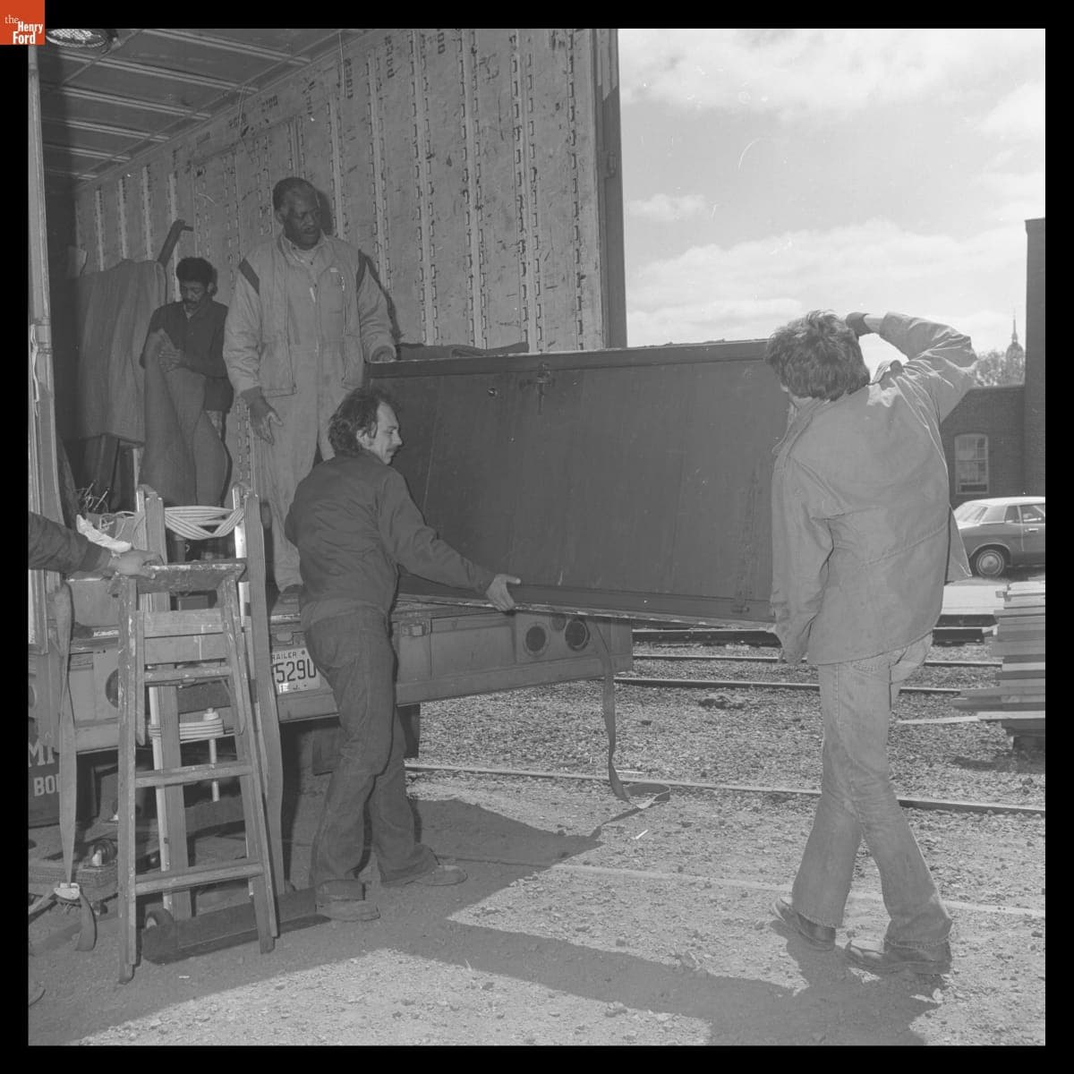 Unloading Portions of Daggett Farmhouse before Reconstruction in Greenfield Village, 1977