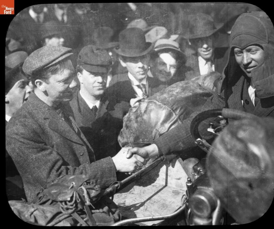 Roberts Shaking Hands with Mathewson, at the Wheel of the Thomas Flyer in Cheyenne, Wyoming, New York to Paris Race, 1908