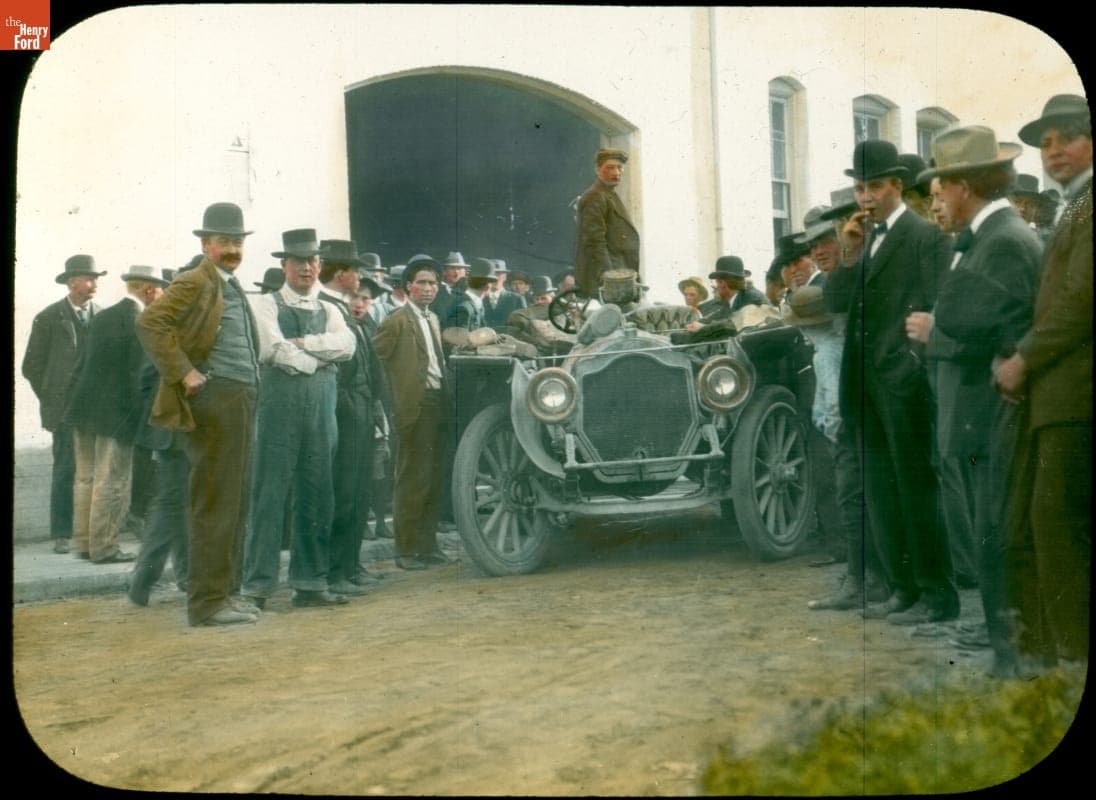 Driver Harold Brinker Standing in the Thomas Flyer, Bakersfield, California, New York to Paris Race, 1908
