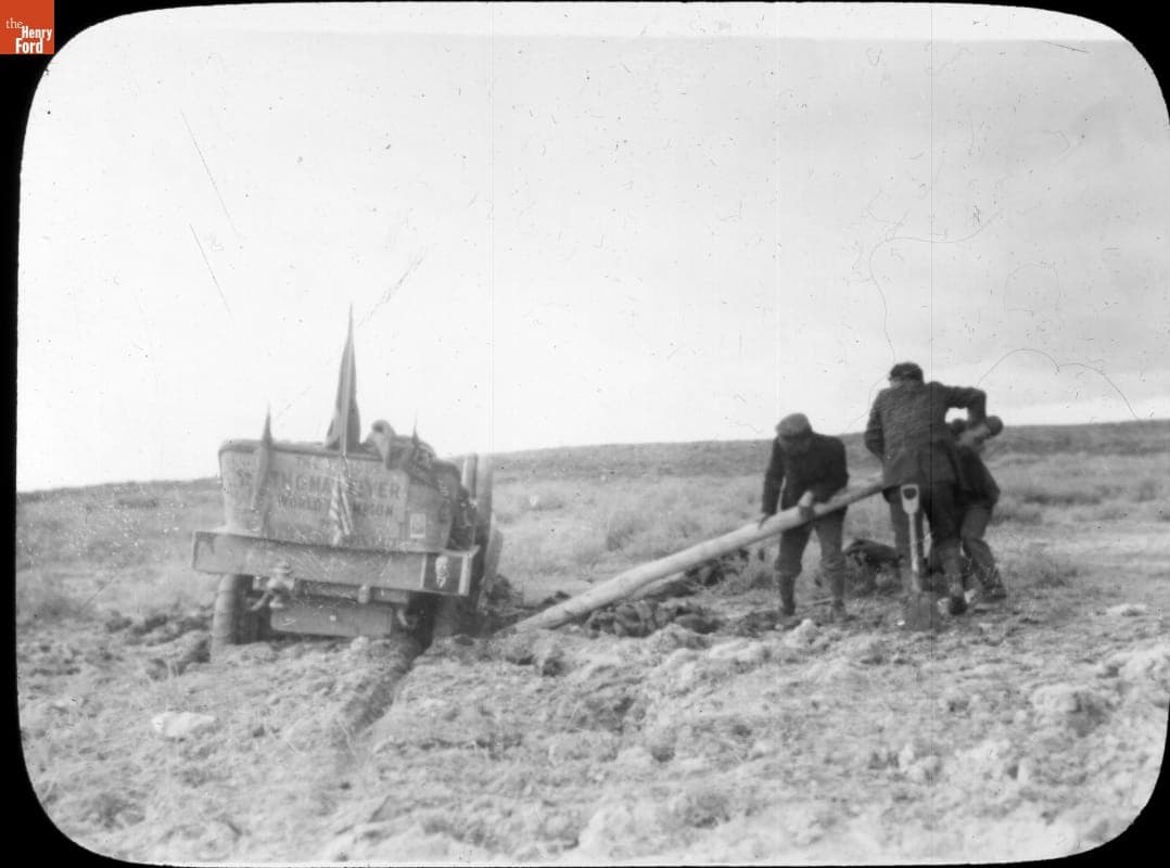 Team Prying the Thomas Flyer out of Mud, Pathfinder Tour before the New York to Seattle Race, 1909