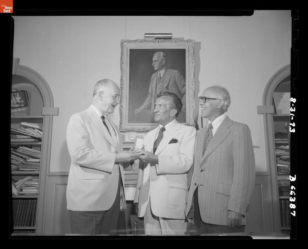 Dr. Donald Shelley and Frank Caddy Present a Watch to Gus Munchow at His Retirement Party, October 1973