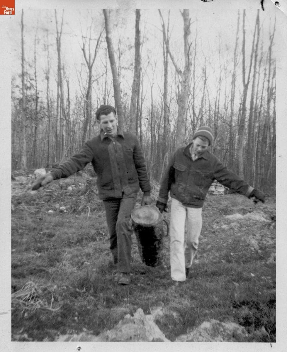 Bob and Bobby Kelley Bringing in the Yule Log, 1957