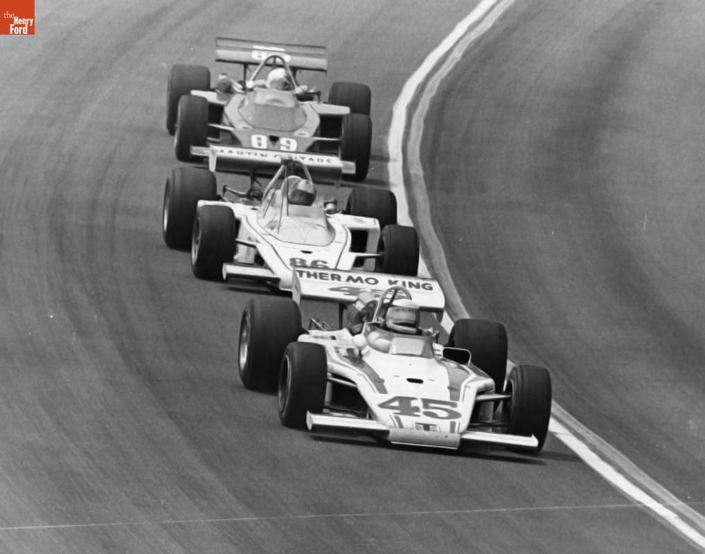 Three Cars Racing during the Schaefer 500 at the Pocono International Raceway, 1974