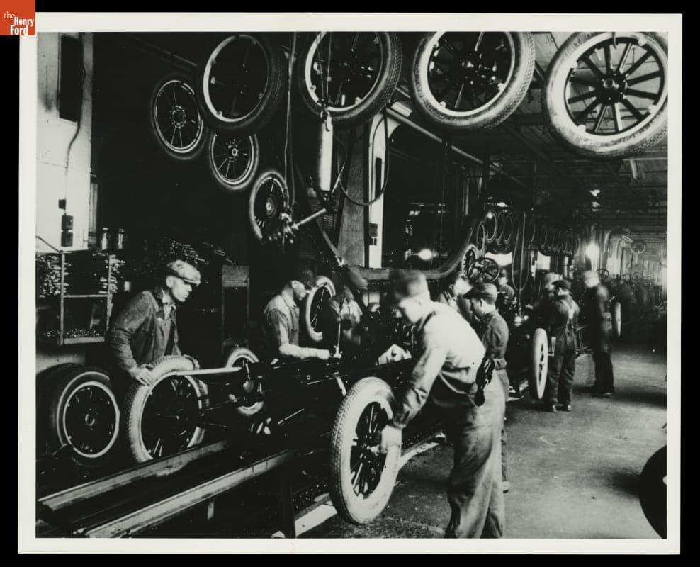 Workers Installing Tires on Ford Model T Assembly Line at Highland Park Plant, circa 1925