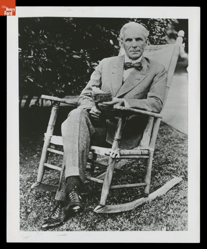 Henry Ford Seated Outdoors, Holding a Newspaper, California, 1919