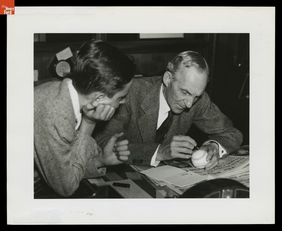Henry Ford Signing a Baseball, 1941