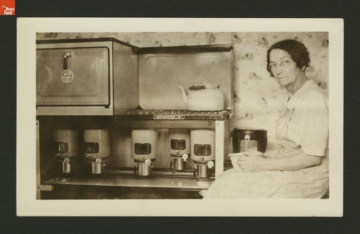 Ida Searl at Her Kerosene Kitchen Stove, September 1934