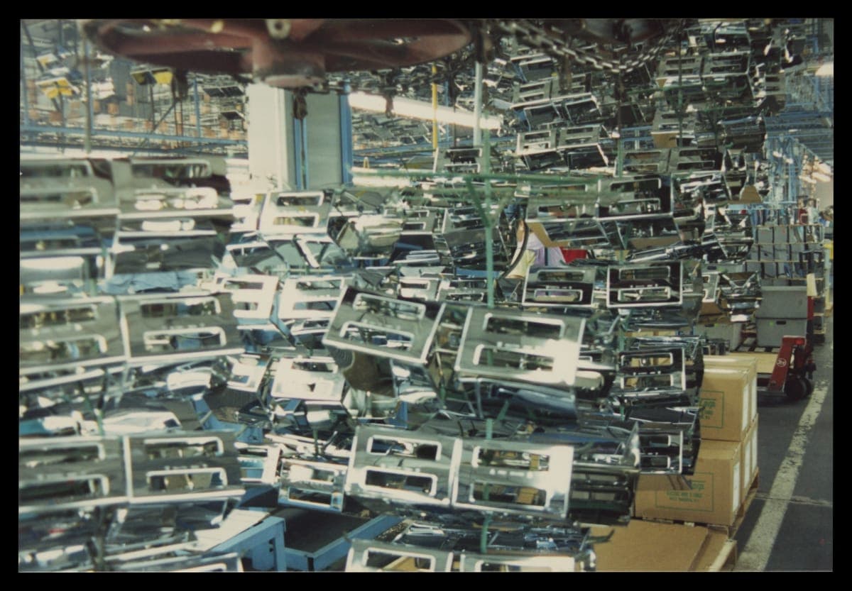 Toaster Parts on a Conveyor Belt at the Factory, circa 2000