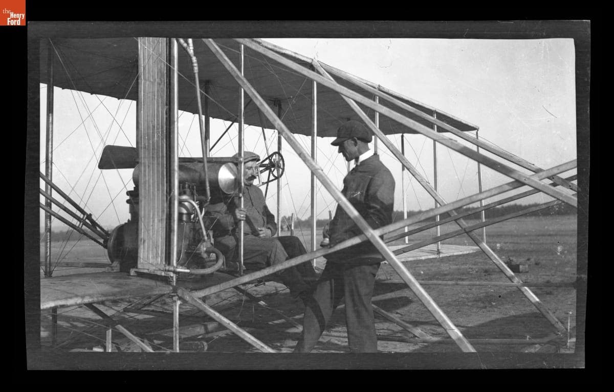 Wilbur Wright and Rene Pellier with the Flyer, Camp d'Auvours, near Le Mans, France, October 5, 1908