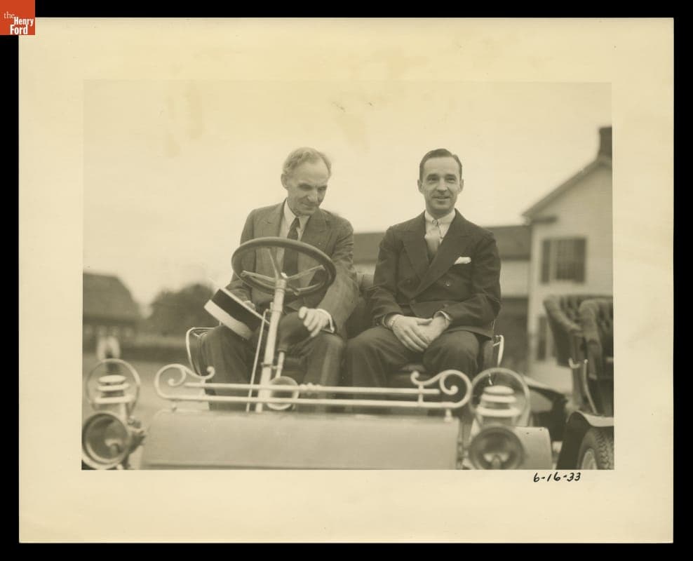 Henry Ford and Edsel Ford in a 1903-1904 Model A on Ford Motor Company's 30th Anniversary, June 16, 1933