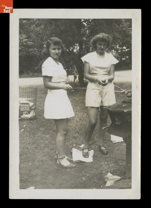 Young Women Roasting Hot Dogs over a Picnic Grill, 1945-1950