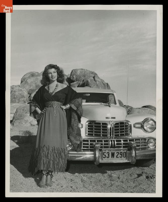 Actress Rita Hayworth with 1947 Lincoln Automobile