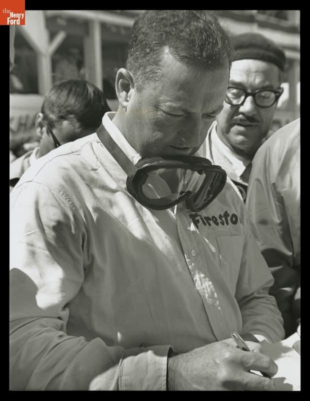 Driver Hap Sharp Signing Autograph at Road America 500 Race, September 5, 1965