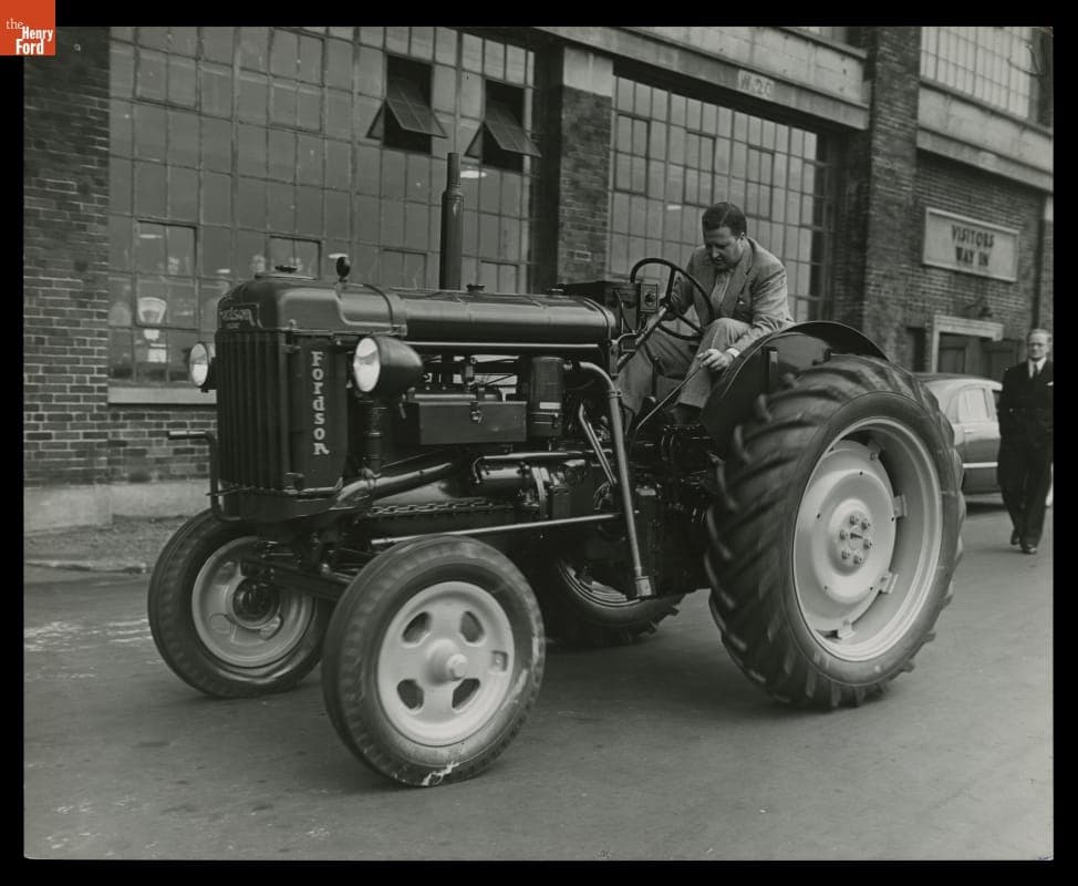 Henry Ford II in a Fordson Tractor, Dagenham, England, 1948-1949